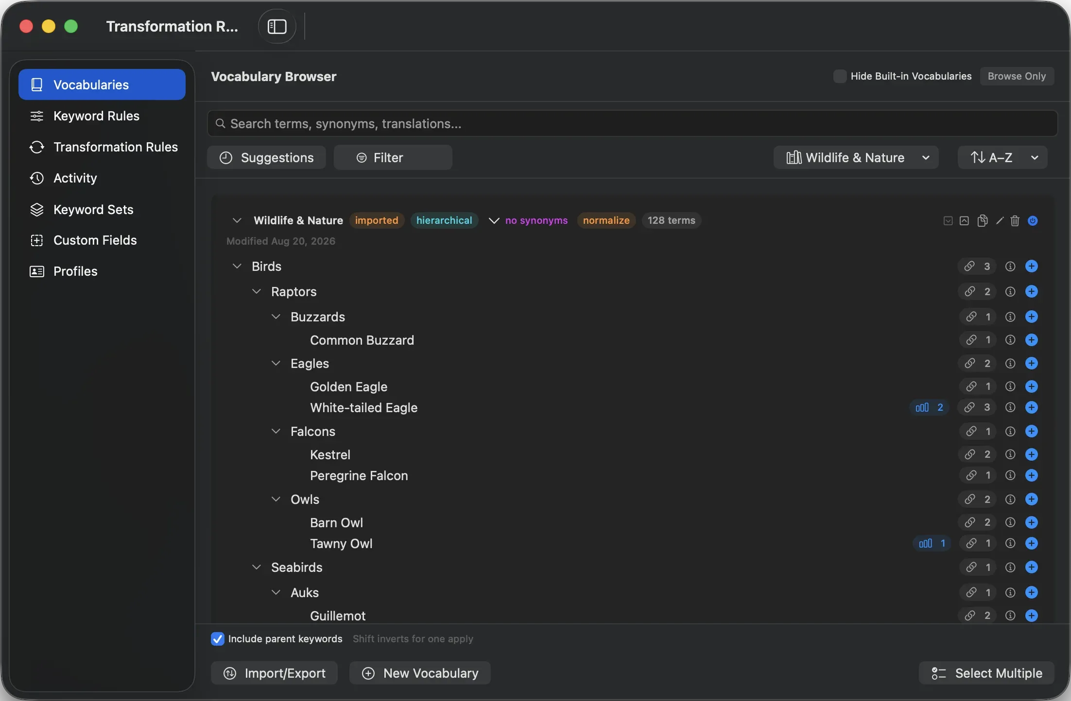 The Vocabulary Browser in dark mode, showing the Wildlife &amp; Nature vocabulary expanded through Birds, Raptors, and Owls, with per-term link counts and a search field across terms, synonyms, and translations.